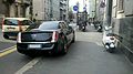 " 13 - ITALY - Lancia Thema (2011) in Milan with Piaggio Vespa.jpg